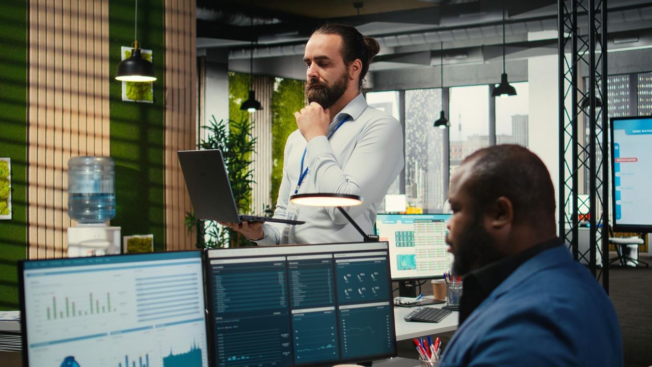 Operations team working at monitoring dashboards
