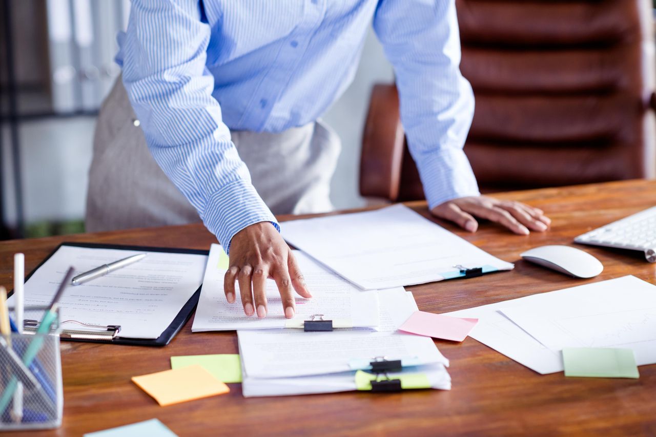 Planning documents spread across a desk