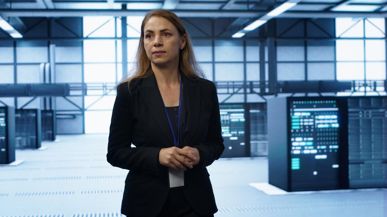 Leader standing in a data center