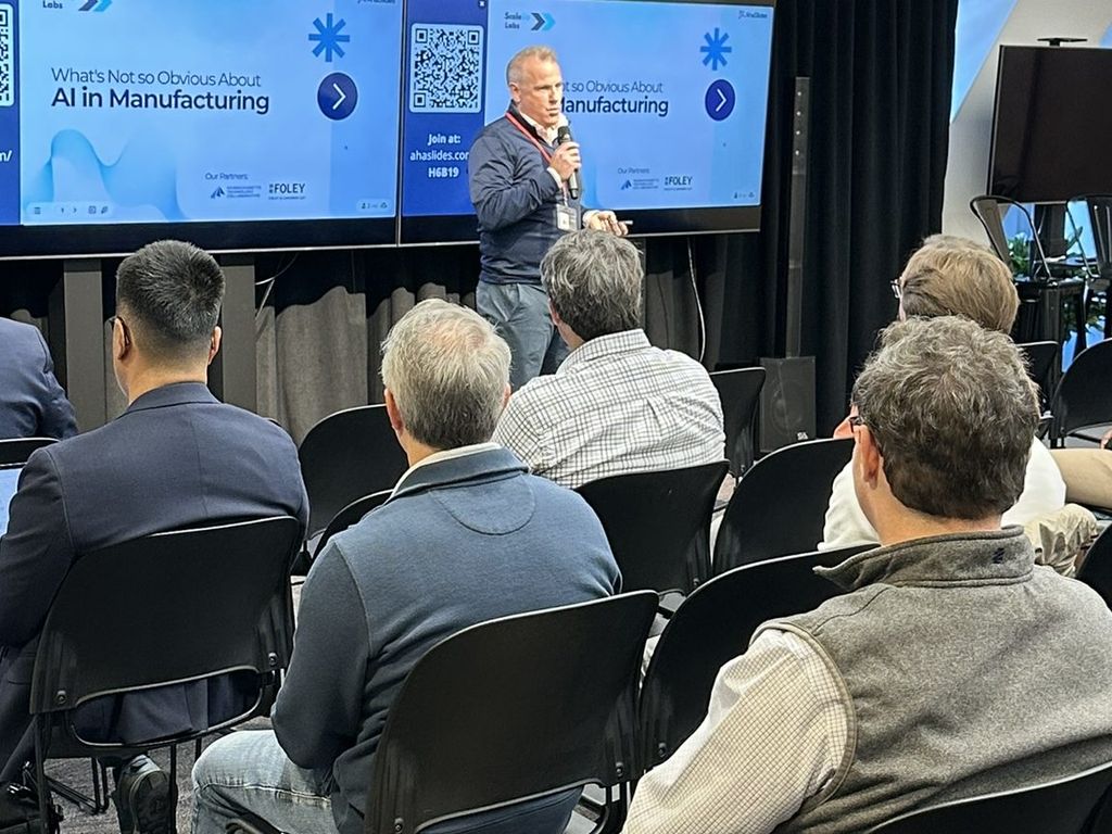 A session on AI in manufacturing at a technology meetup